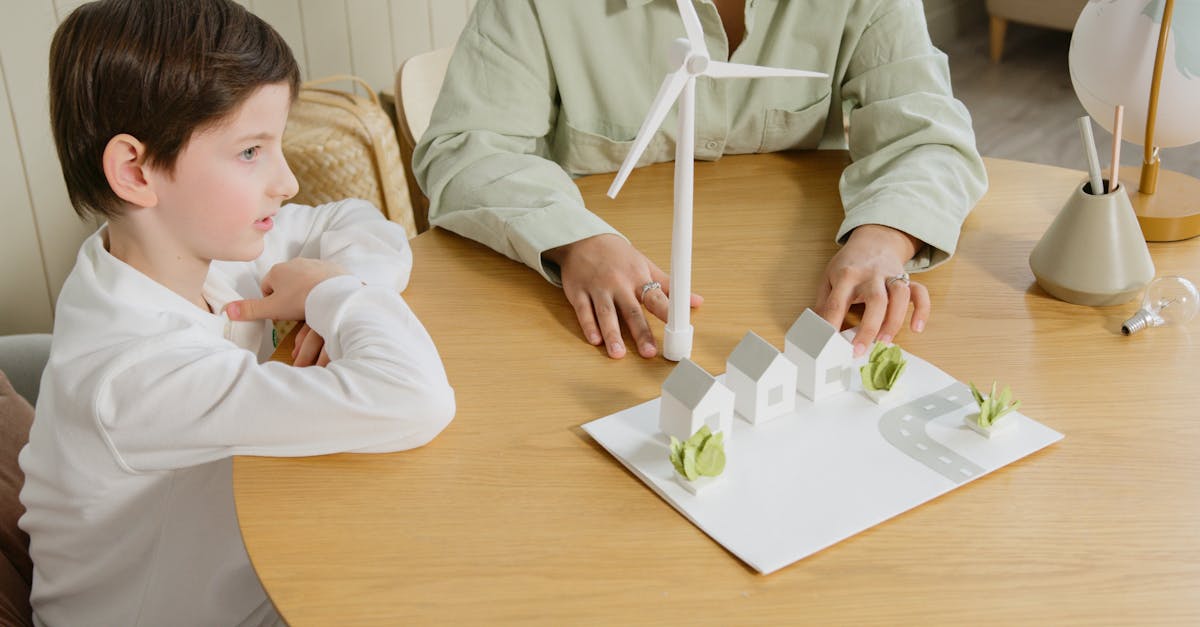 a child explores renewable energy models in a classroom setting 1