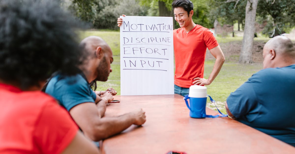 a diverse group of adults engaged in a motivational team building session outdoors 1