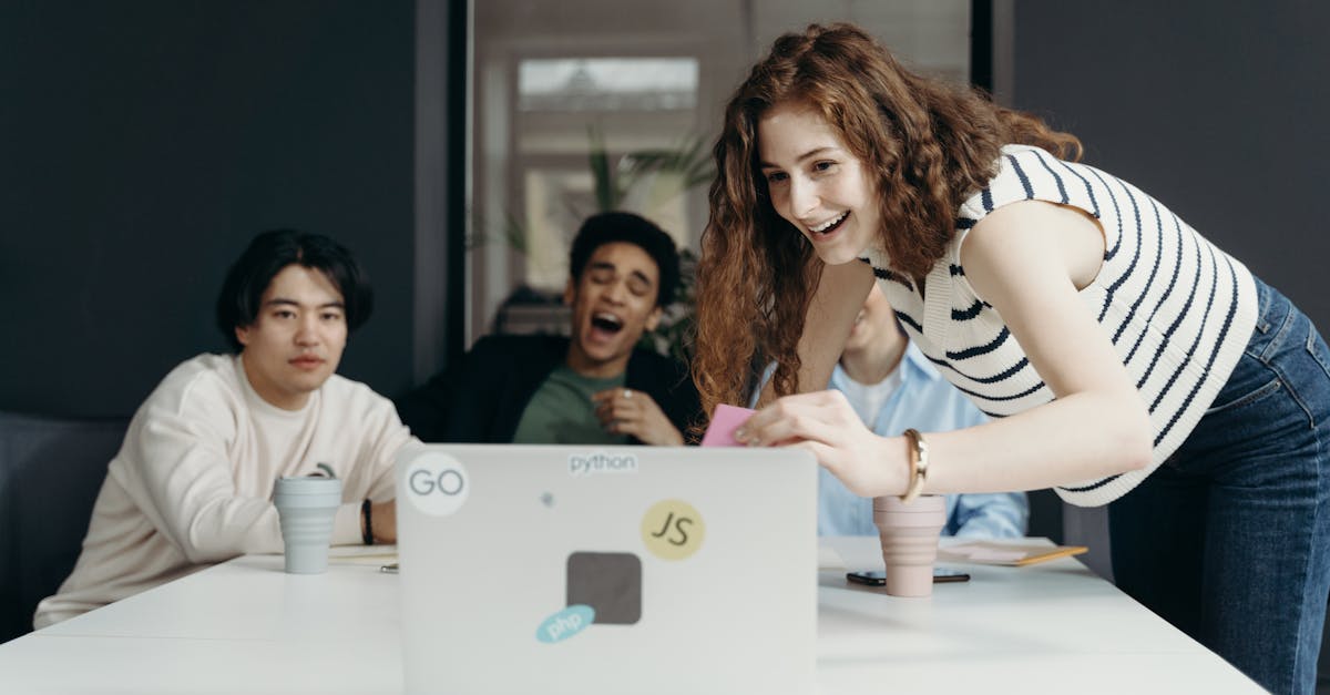 a diverse group of young professionals collaborating enthusiastically in an office setting 2