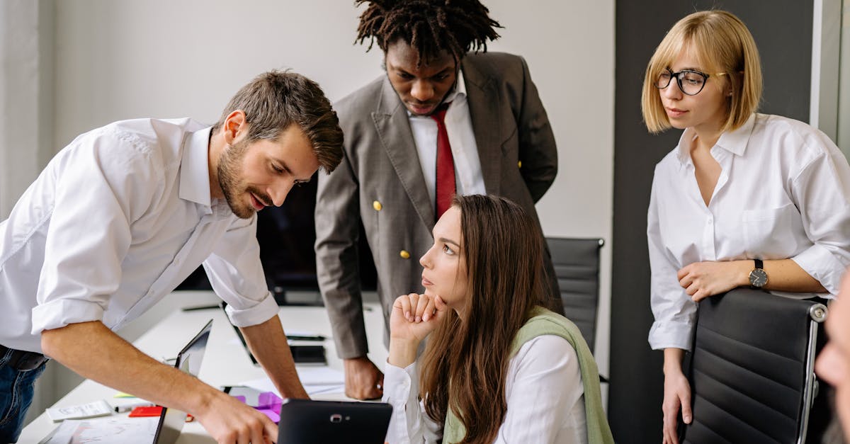 a group of professionals engaging in a collaborative business meeting in a modern office 1