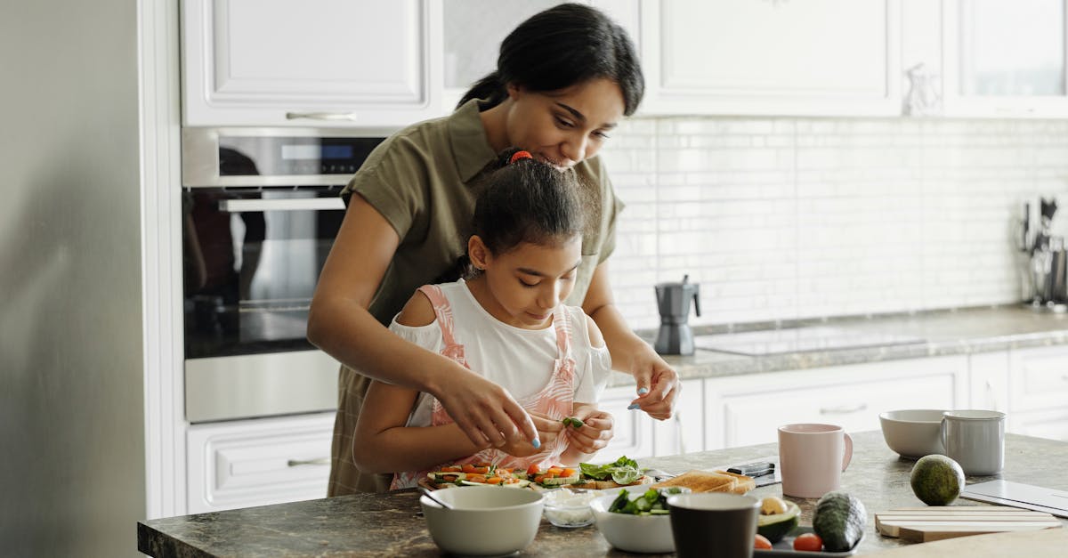a mom and daughter share a bonding moment while preparing a healthy lunch together in the kitchen 1