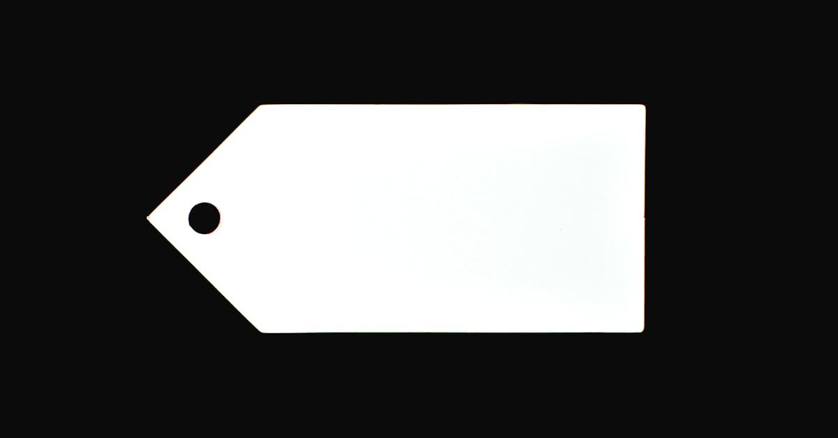 a white blank price tag against a black background perfect for commercial use