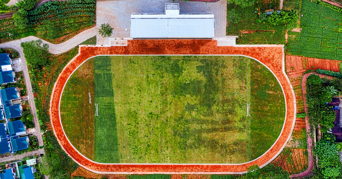 aerial shot of an oval sports ground surrounded by greenery in banten indonesia