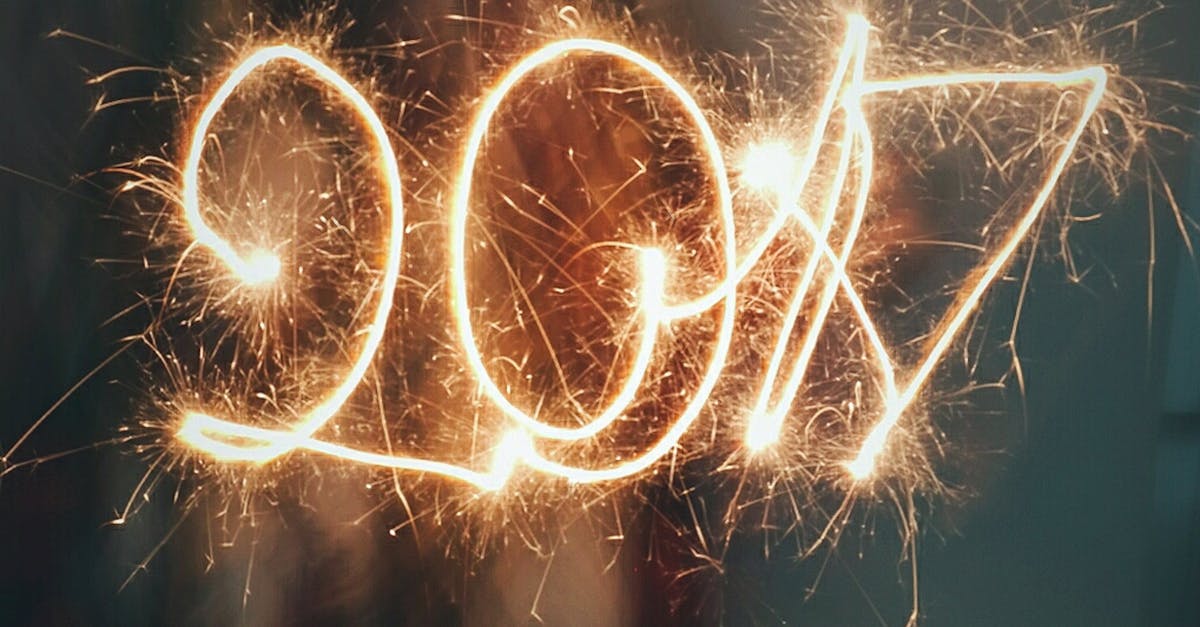 bright sparklers creating 2017 with long exposure effect at night