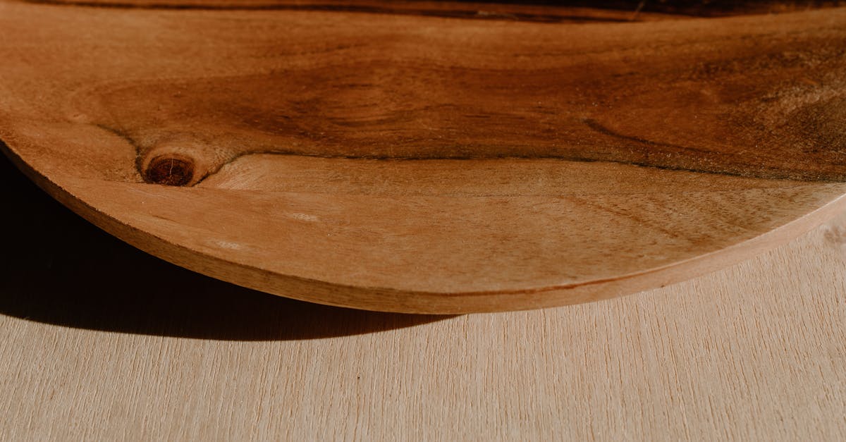close up of a wooden plate showcasing natural woodgrain texture and rustic design