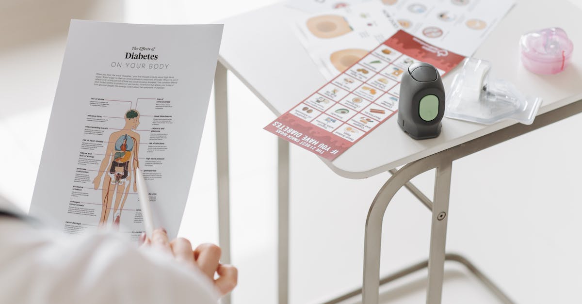 close up of diabetes management tools and educational materials on a table