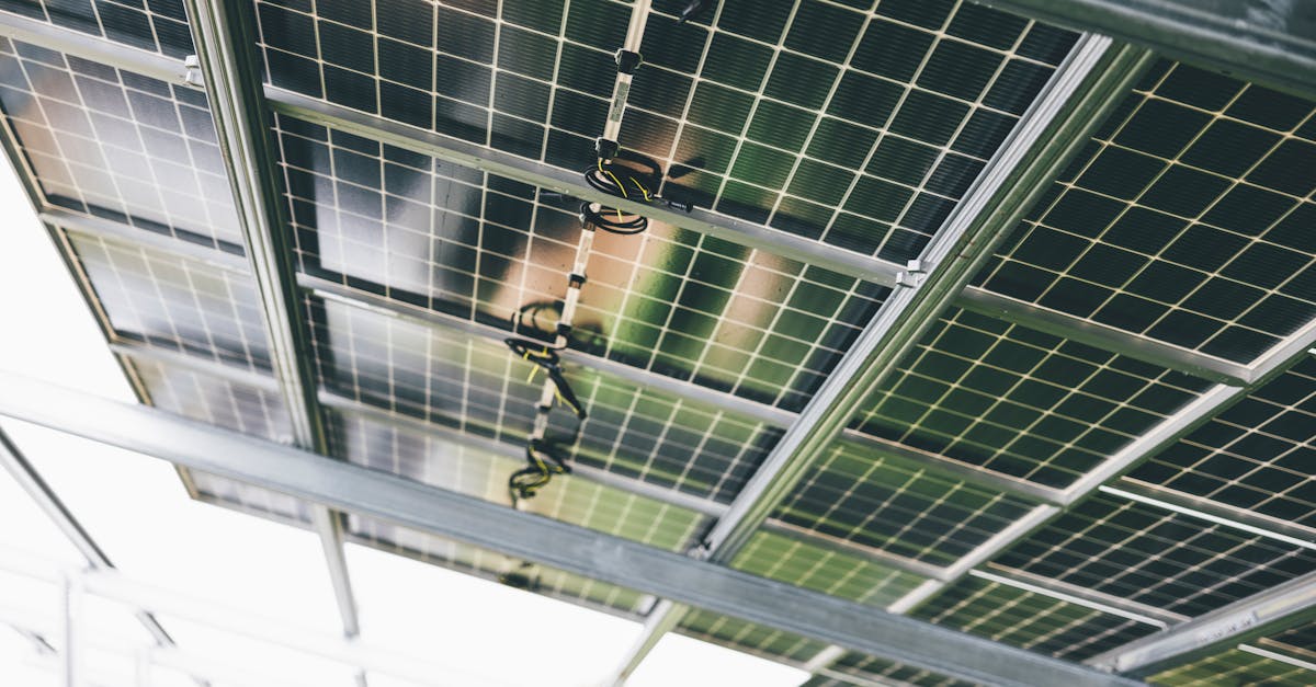 close up of solar panels being installed outdoors with technicians visible 1