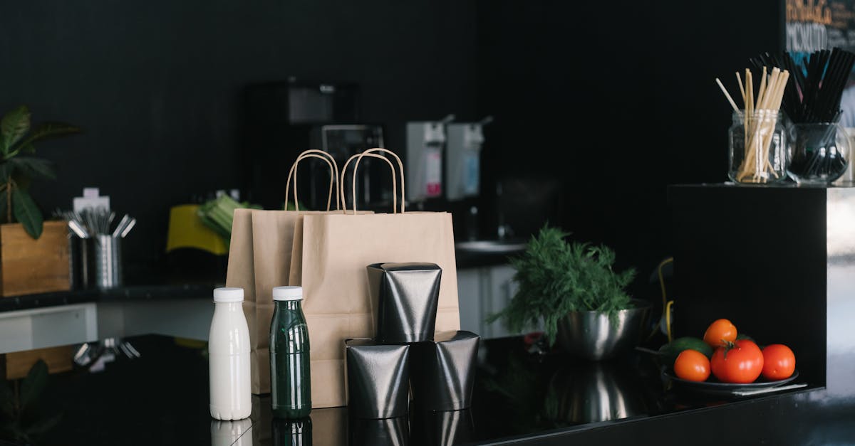 eco friendly takeaway packaging in a modern kitchen setting with fresh ingredients and cutlery 2