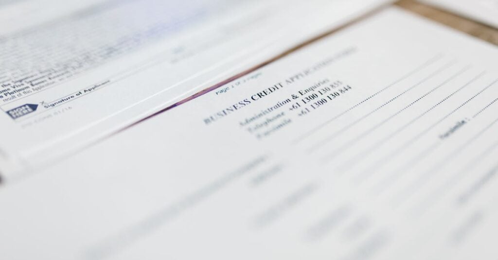 focused image of business credit application papers ideal for finance themes