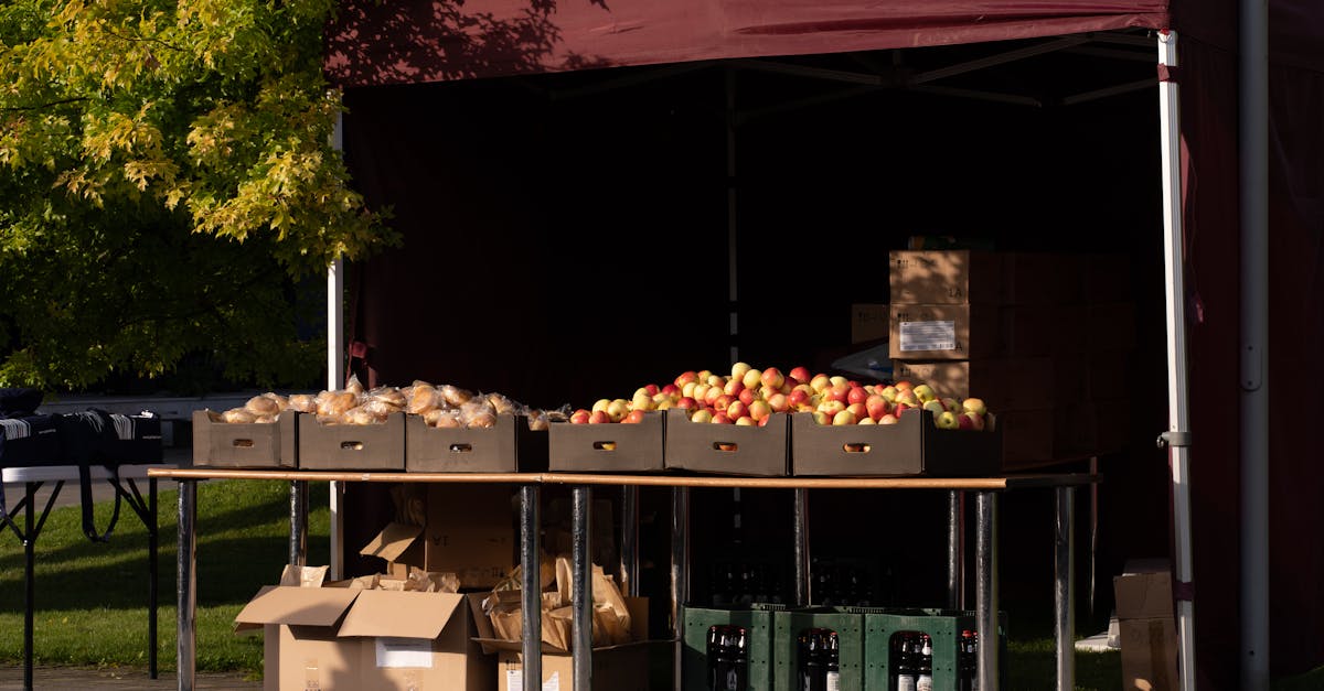 outdoor market stall with fresh apples in autumn sunlight ready for sale 1