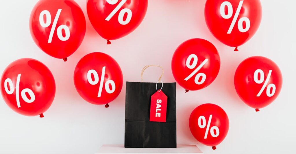 red balloons with percentages and a black sale bag on a white background 1