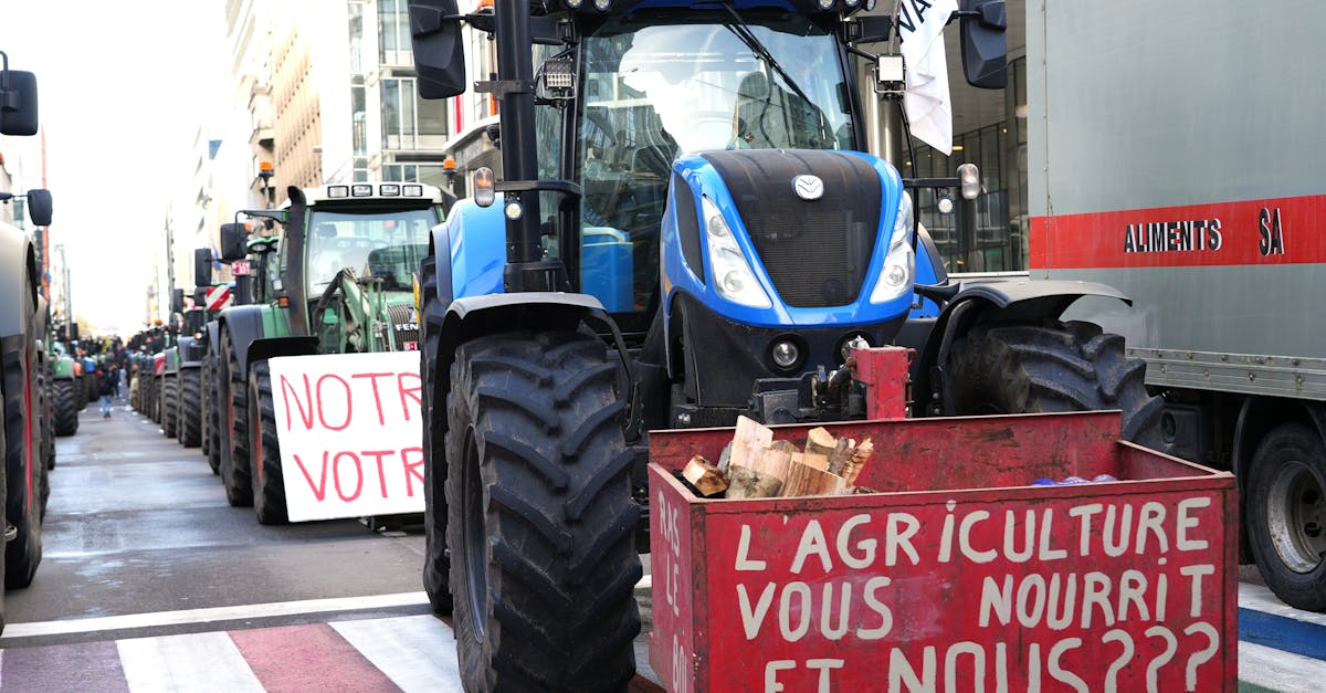 tractors line a city street in a protest advocating for agricultural issues