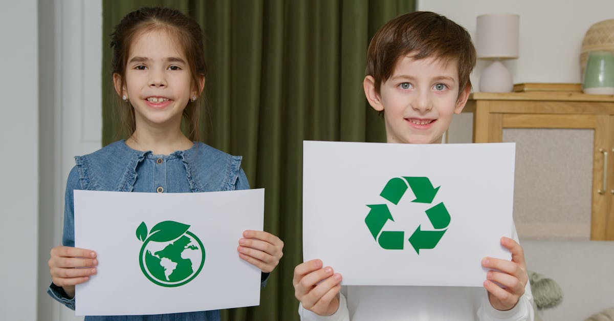 two children holding eco friendly signs indoors promoting sustainability 1