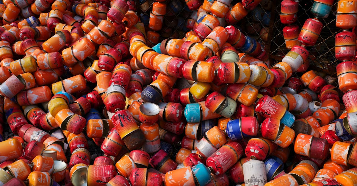 vibrant pile of discarded metal canisters waiting for recycling process