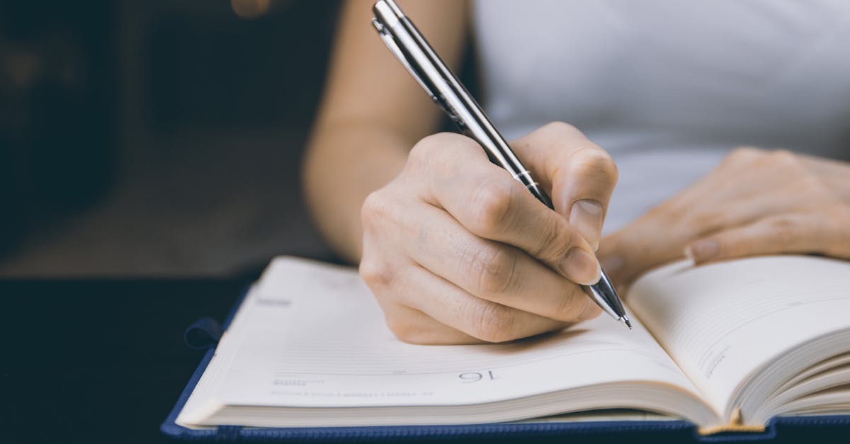 woman writing in a notebook capturing a moment of focused concentration 1
