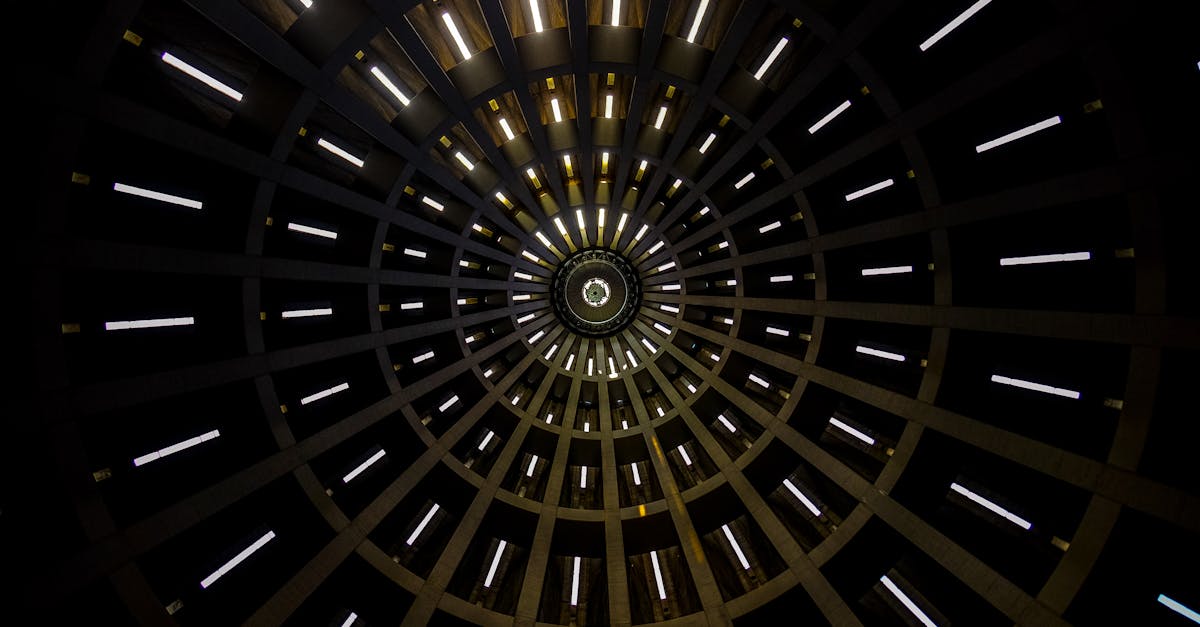 a mesmerizing abstract view of a circular dome with illuminated patterns creating a geometric design