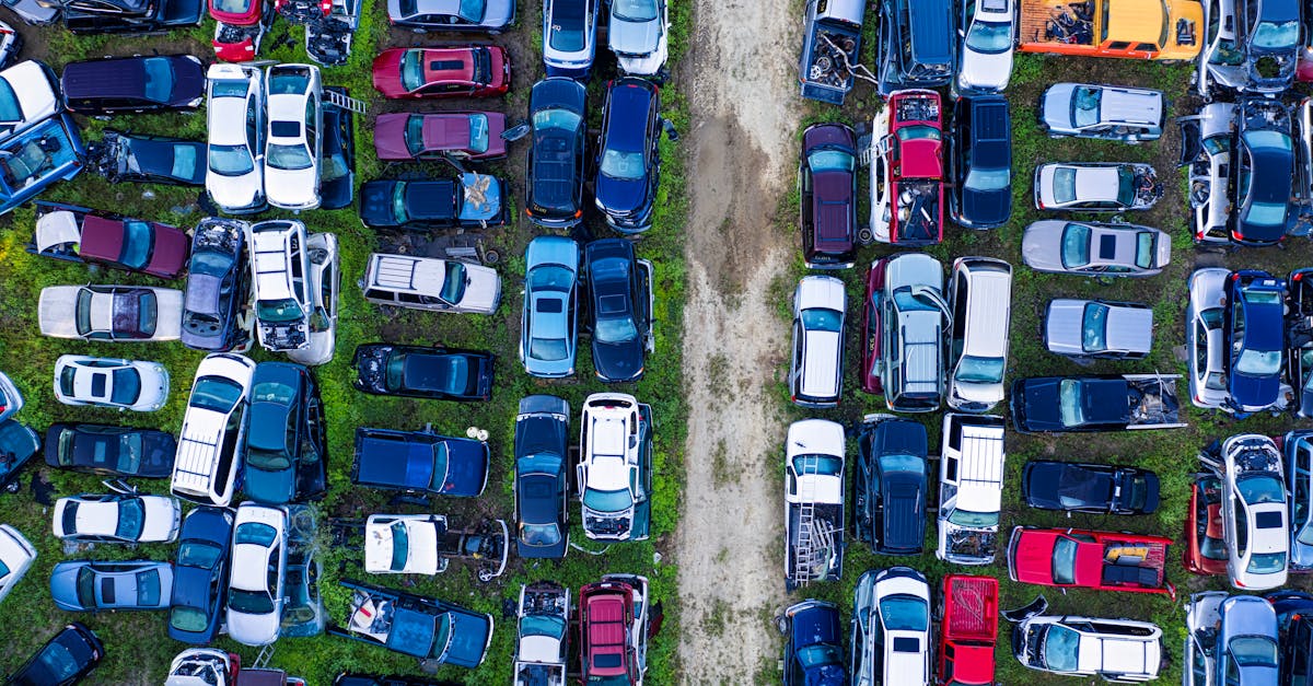 aerial view of a car junkyard in red wing mn showcasing rows of parked vehicles