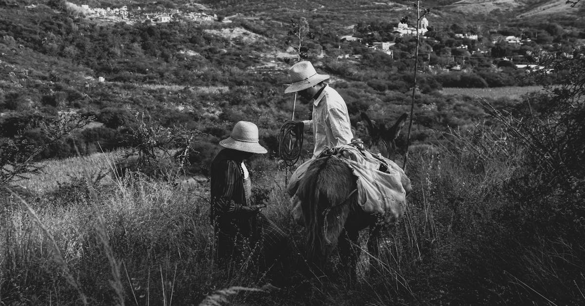 black and white image capturing rural life in san miguel ixitlan mexico with local farmers