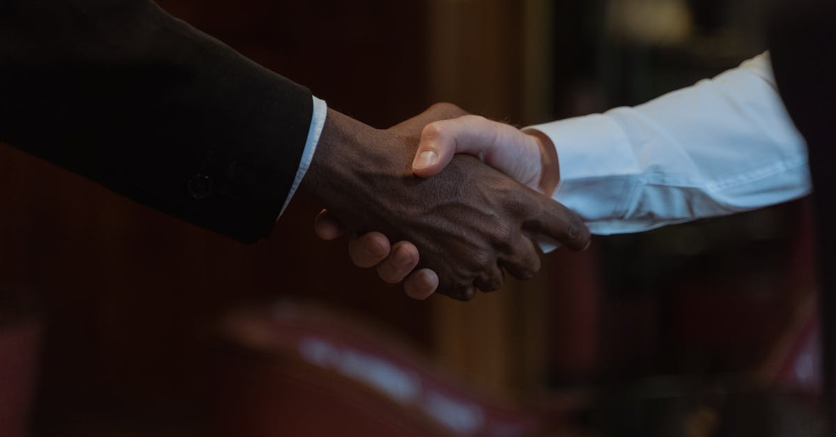 close up of a diverse handshake representing business collaboration and diversity