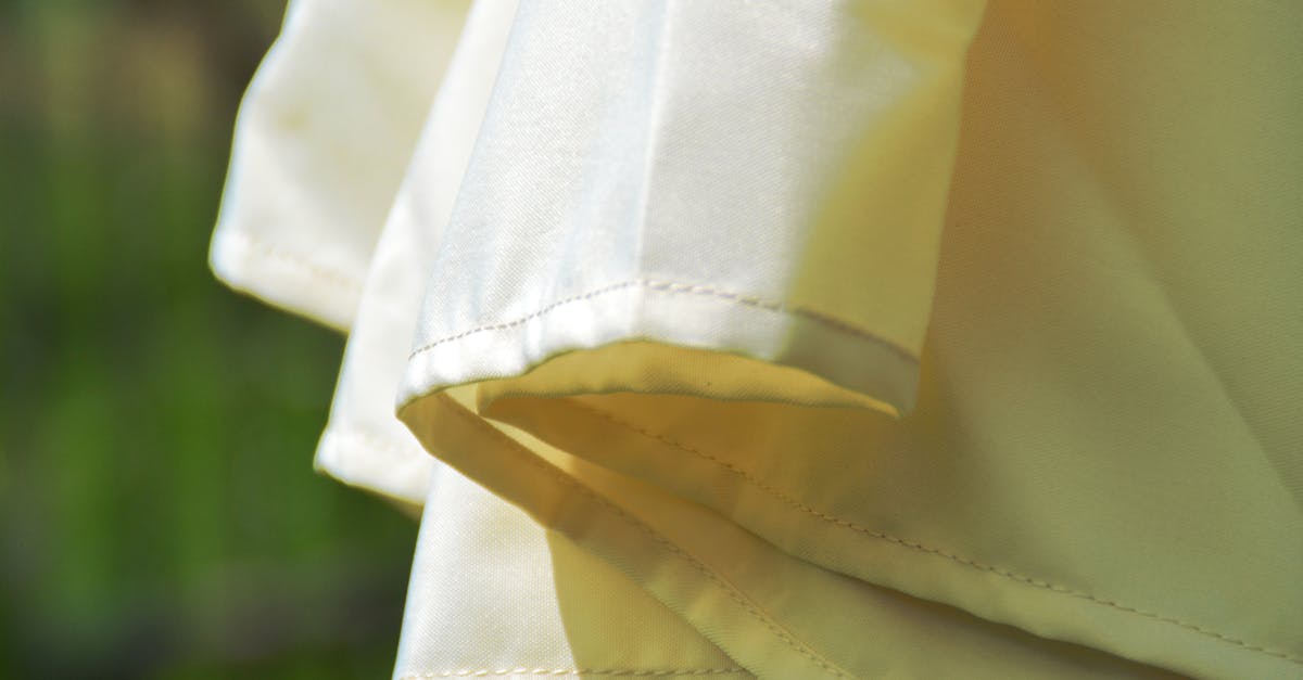 detailed view of sunlit beige fabric perfect for outdoor summer themes