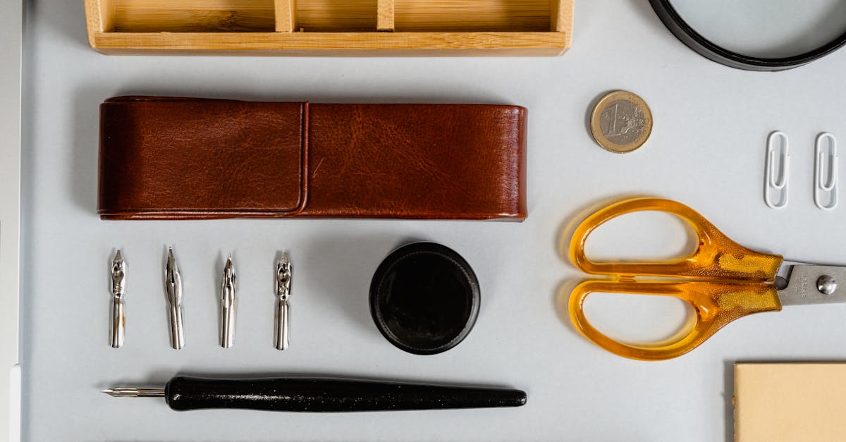 top view of writing tools office supplies and stationery arranged on a flat surface