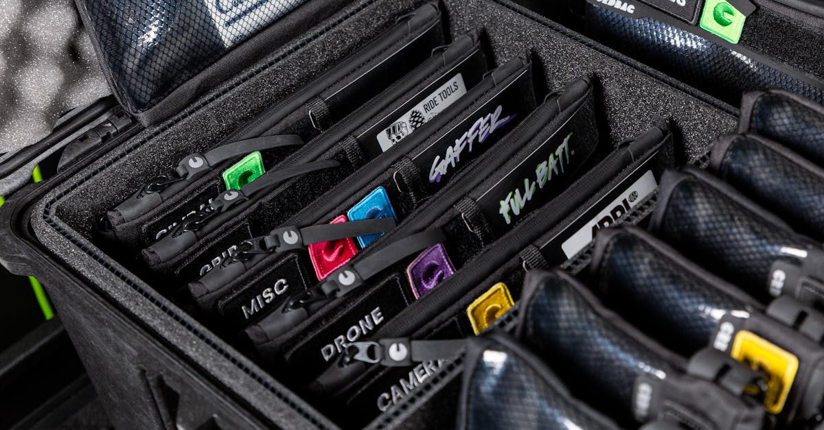 a detailed view of labeled gear compartments in a sturdy protective case ideal for travel