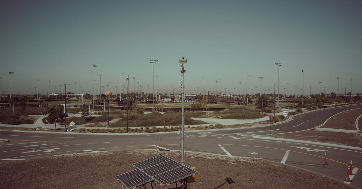 a mobile solar power unit in an open field area captures clean energy