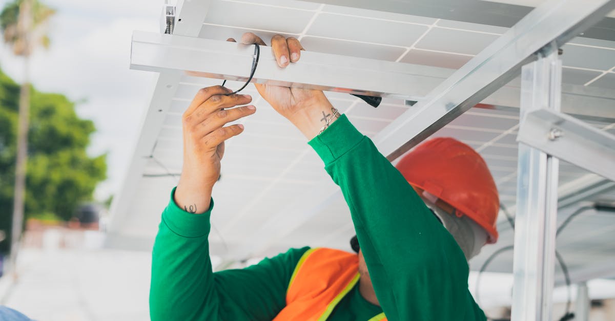 a solar technician in ppe installs a solar panel showcasing renewable energy work 1