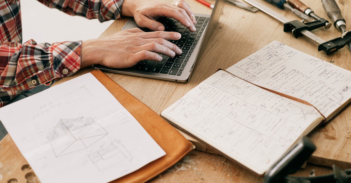 a woodworker uses a laptop to design furniture in a workshop setting highlighting the blend of tech 2