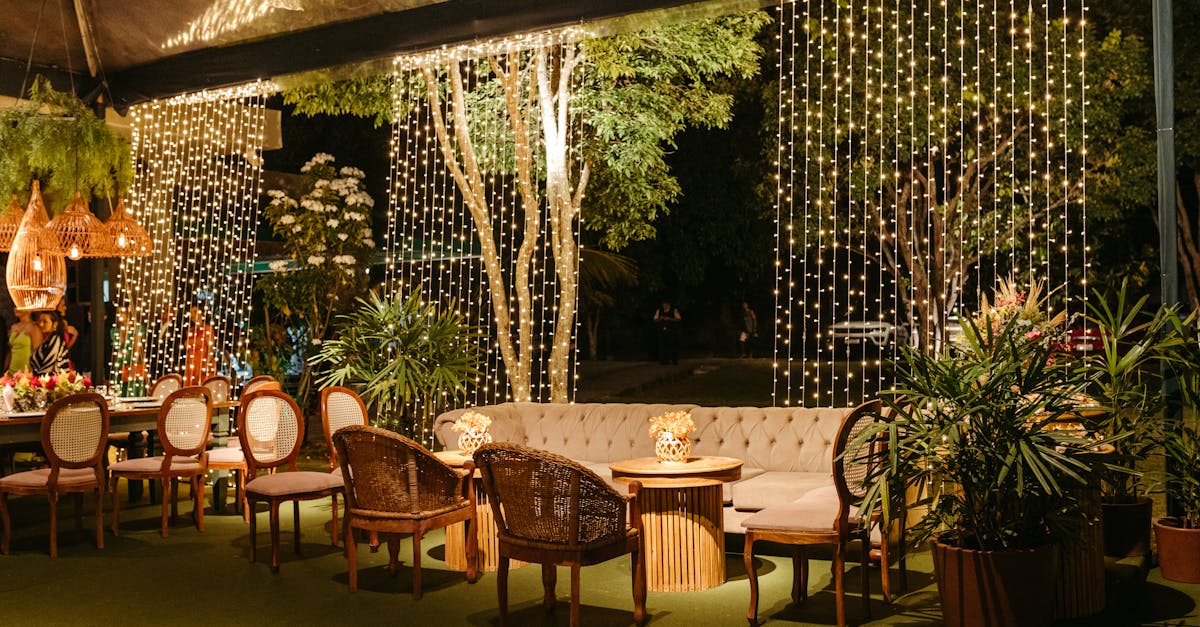 charming outdoor seating area with elegant lights and greenery perfect for relaxed gatherings at ni