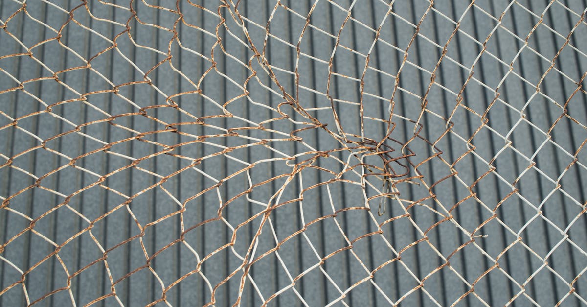 close up of a rusted wire mesh forming an intricate grid pattern 1