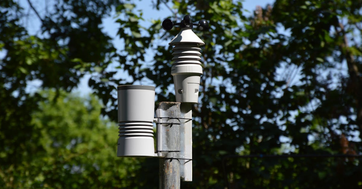 close up of an anemometer and weather device on a sunny day outdoors 1