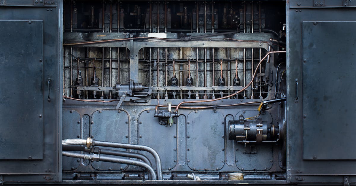 detailed view of complex industrial machinery parts and metal pipes