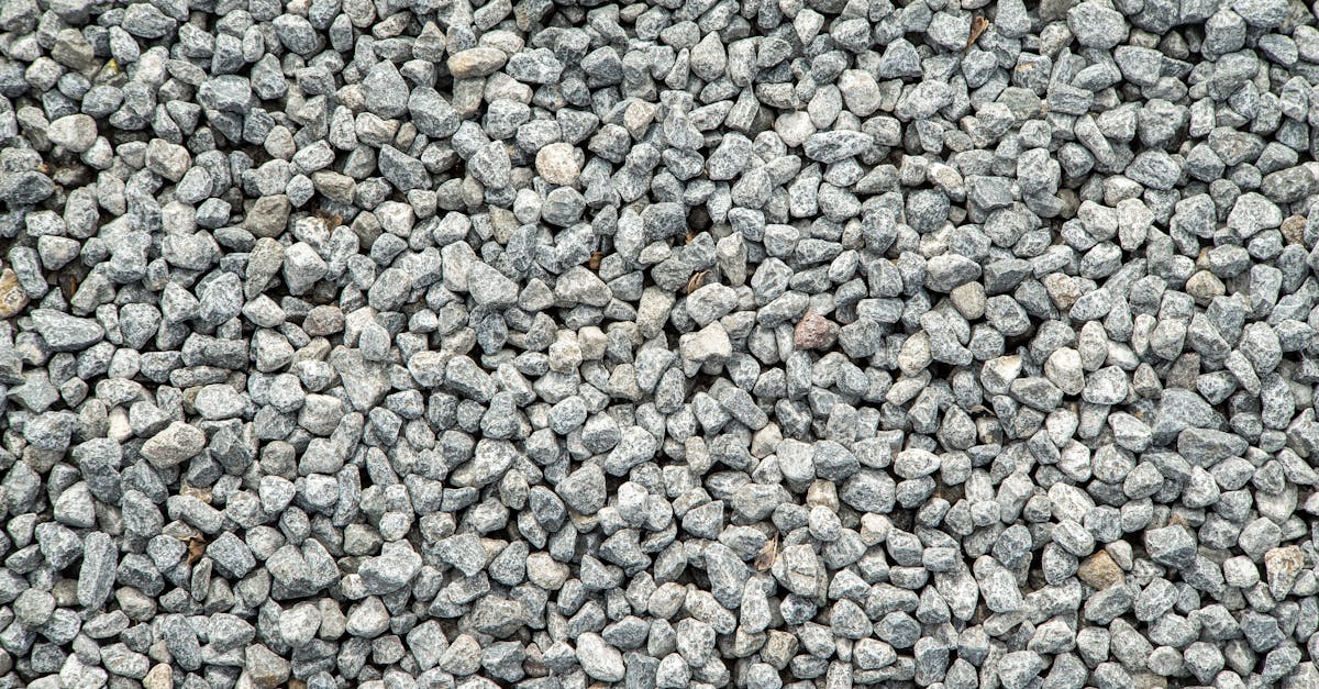 detailed view of grey gravel stones creating a textured pattern for background use