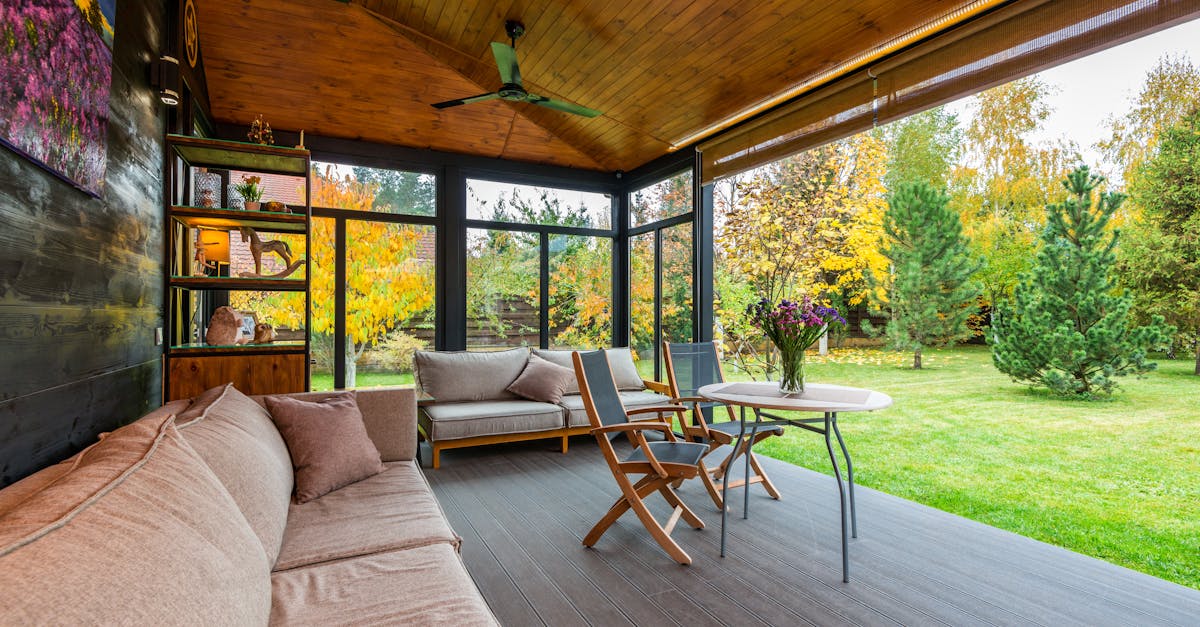 elegant modern porch with comfortable seating and vibrant garden view 1