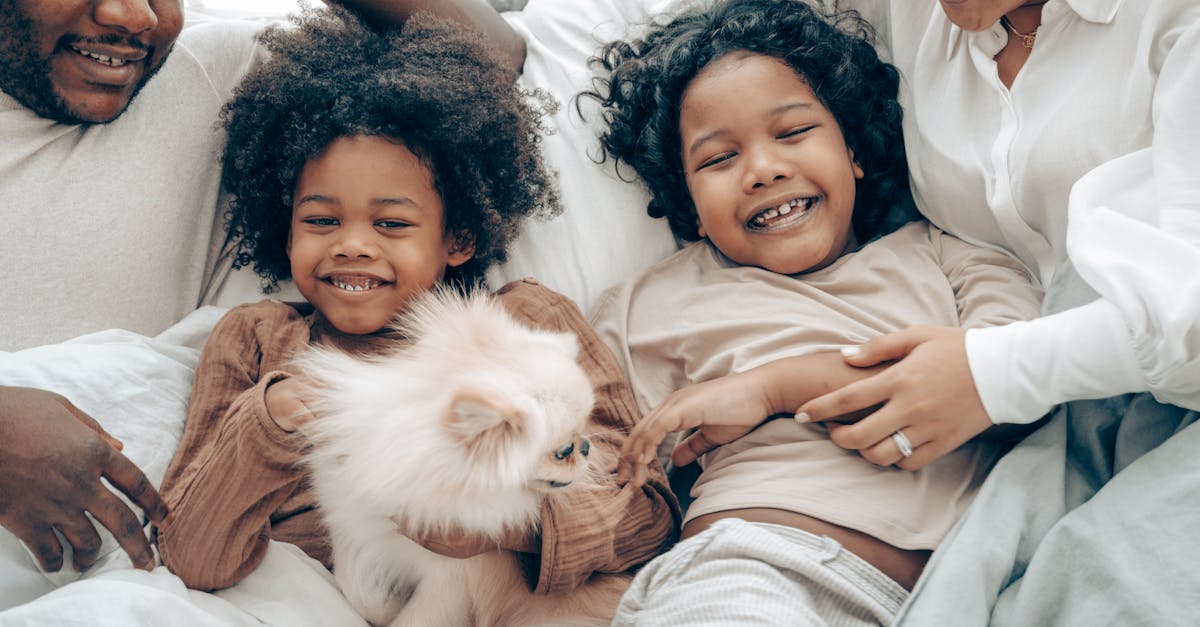 happy family bonding time with kids and a pomeranian dog in cozy home setting